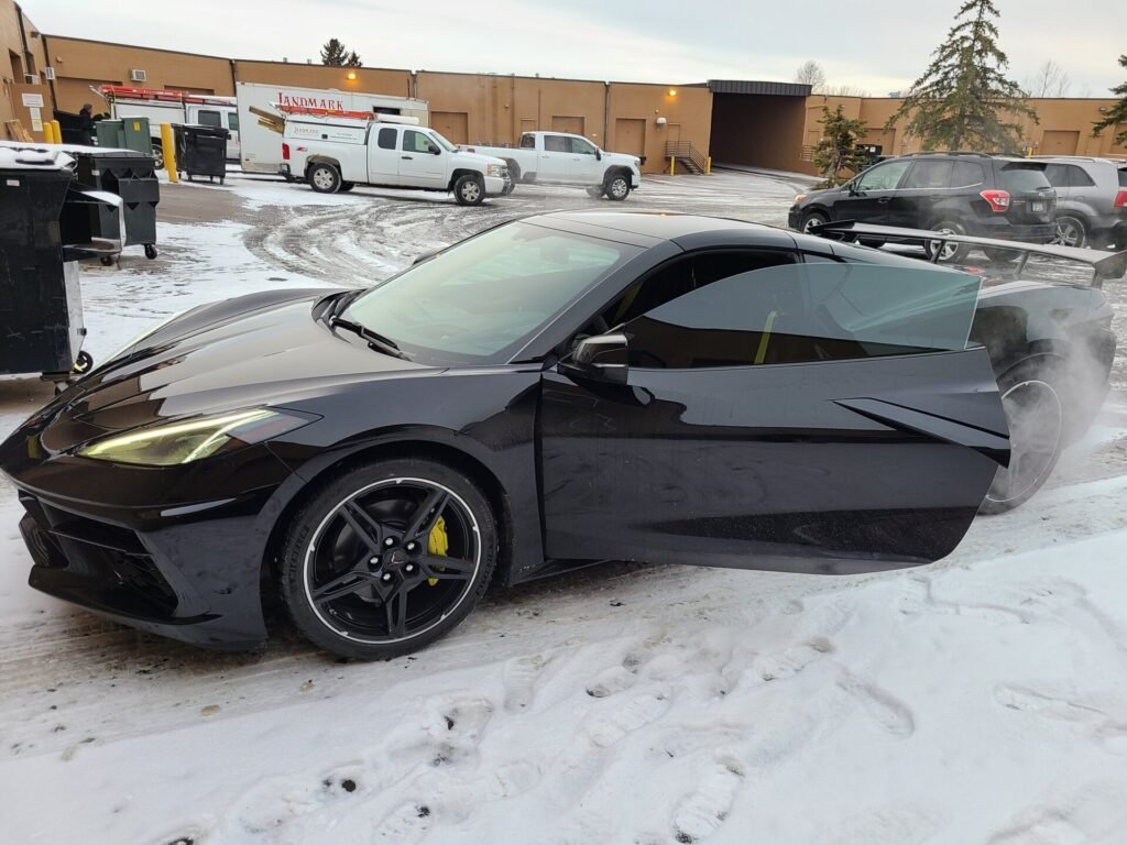 A black car on a snow