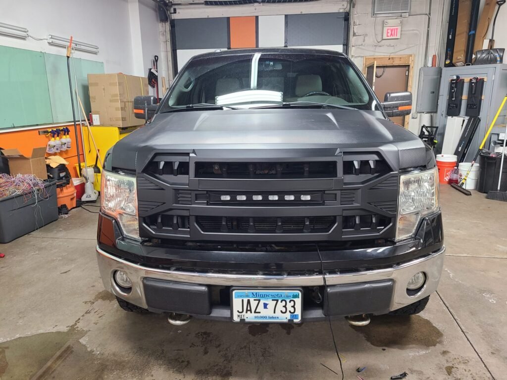 A front of a black car