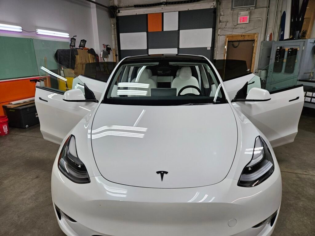 A front of a white car